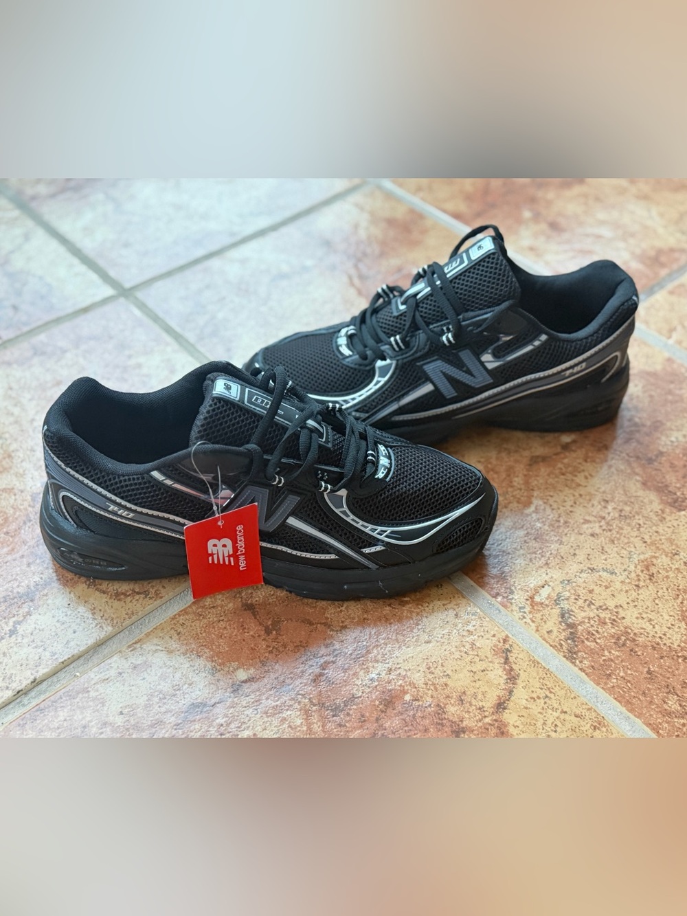 Size 10 And Women’s 11.5 - New Balance 740 Black and Silver Mesh